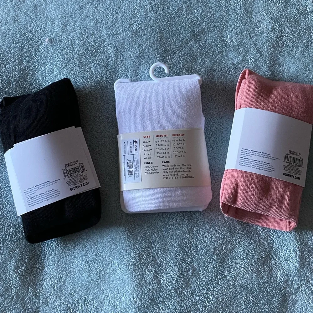 Toddler Pink, white, and black tights